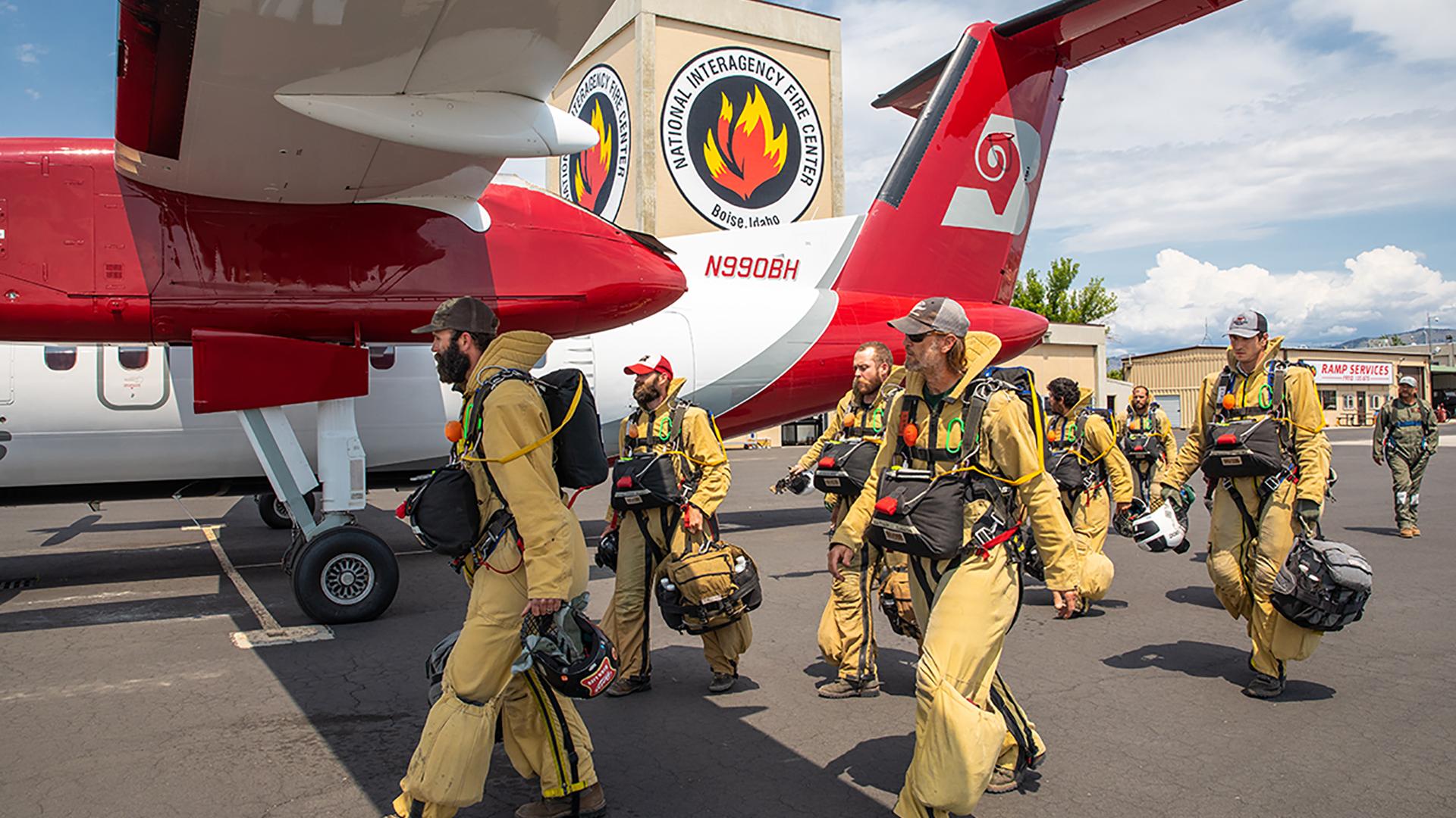 Smokejumpers prepare to board plane at the National Interagency Fire Center in Idaho. Photo by Neal Herbert, DOI.