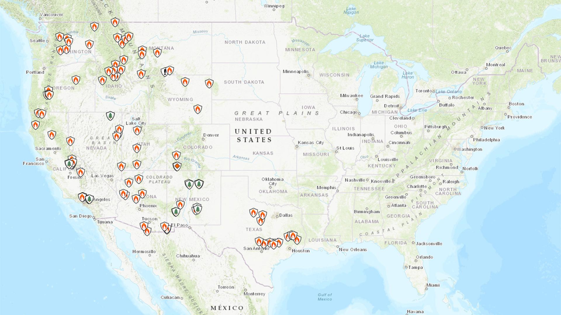 An interactive map of the U.S. with icons showing the location of each wildfire, with many fires located in the West.