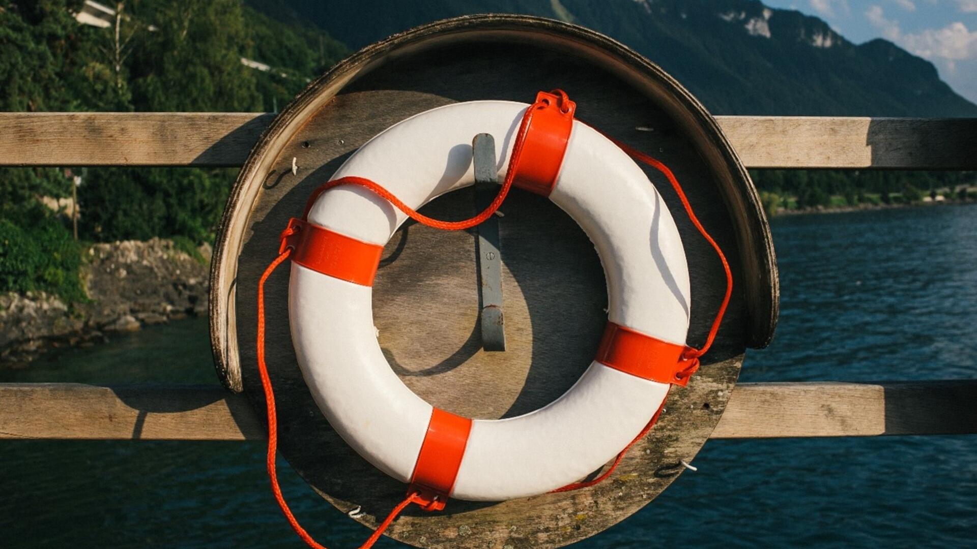 Life preserver ring on pier