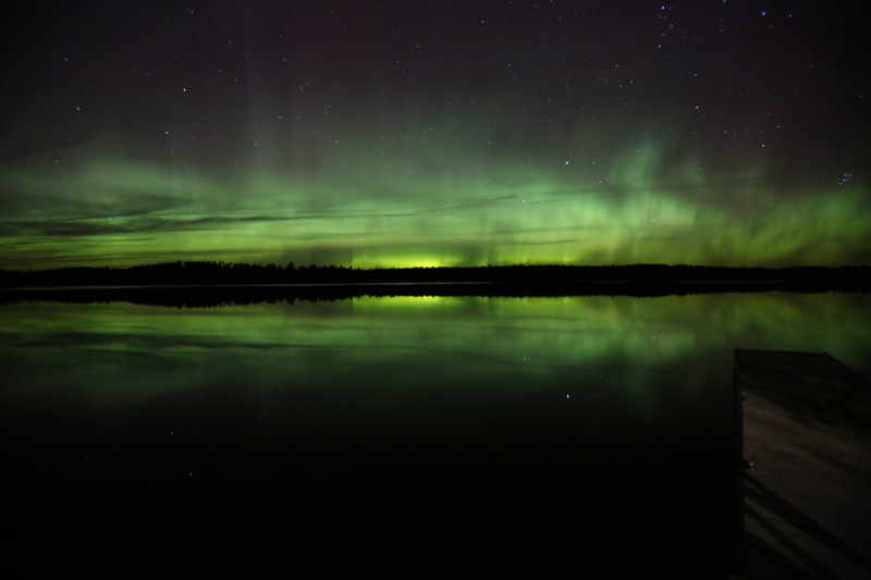 The Aurora Borealis, consisting of shades of green, over Voyageurs National Park