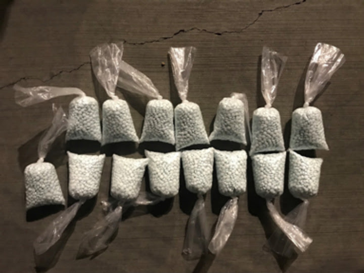 Plastic bags filled with fentanyl pills.