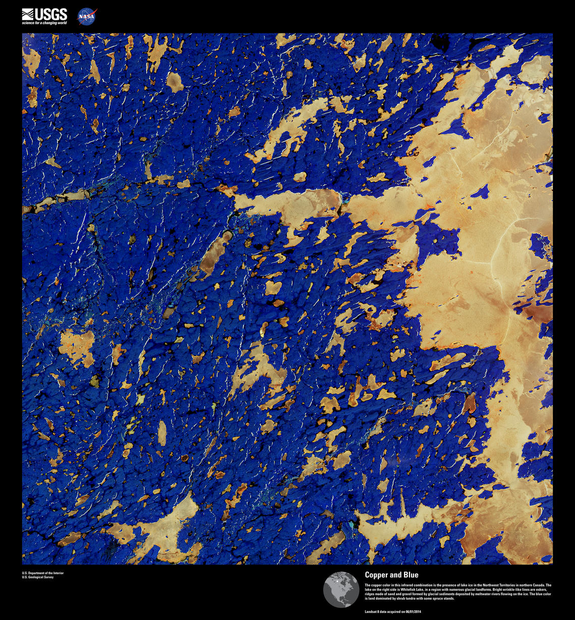 Dark blue with splashes of golden brown across a rugged landscape.