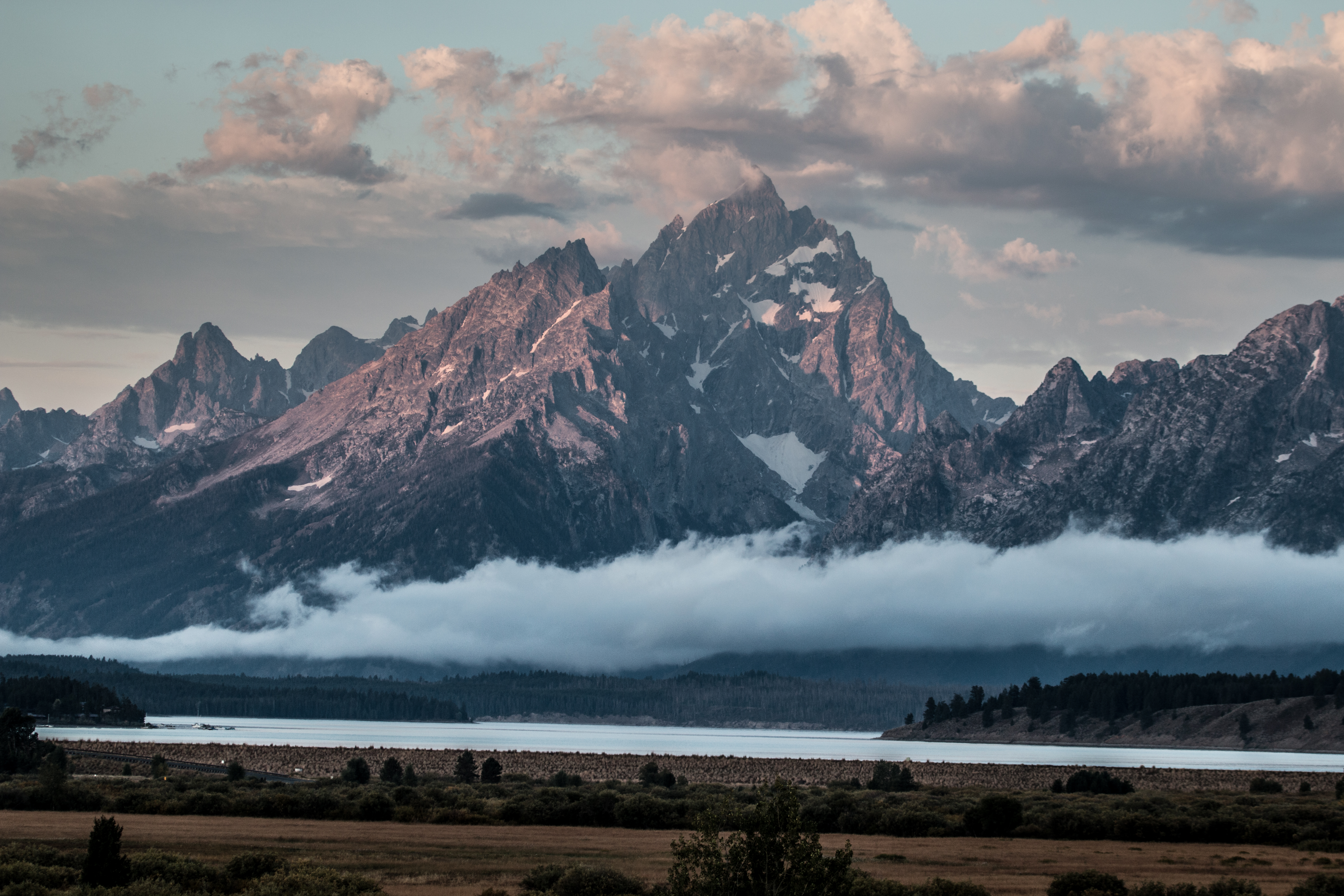 Clouds over the major peaks of the Teton Range over Jackson Lake and Willow Flats.