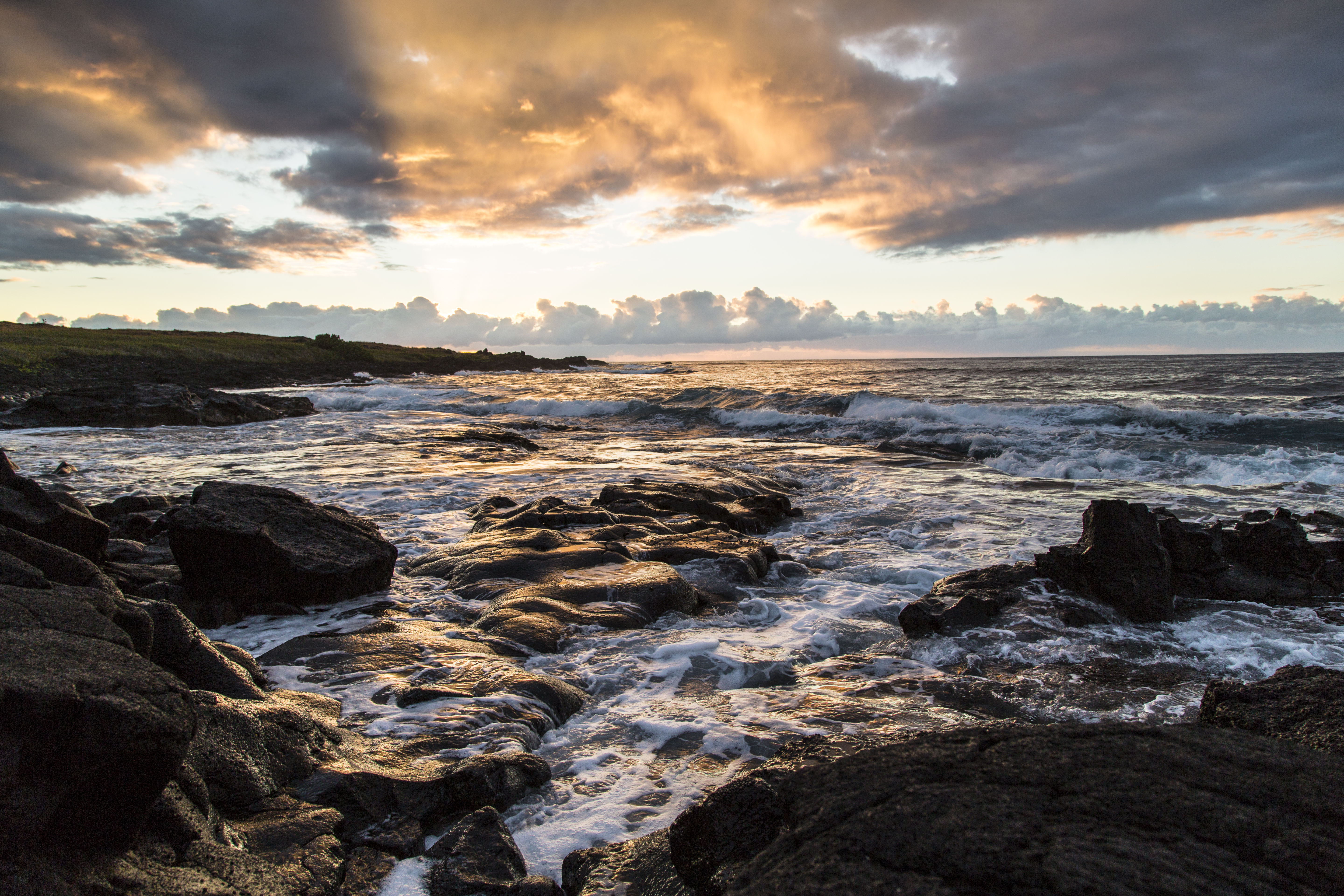 Shoreline at sunset at Hawai‘i Volcanoes National Park. 