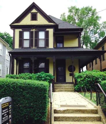 Martin Luther King, Jr.'s birth home is a two story wooden house with a side porch and shutters and a small front yard.
