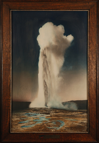 Hand-tinted photograph of the Old Faithful Geyser, Yellowstone National Park, circa 1916