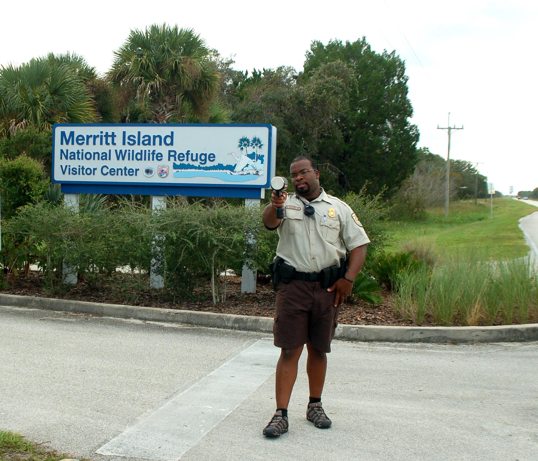 FWZO Bruce B. Butler Jr., one of the IACP Awardees demonstrates using a speed radar gun at Merritt Island NWR, Titusville, FL.   