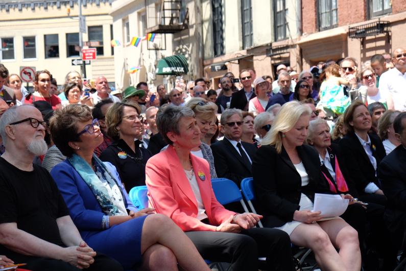 Secretary Jewell attentively listens while sitting with members from the LGBT community. 