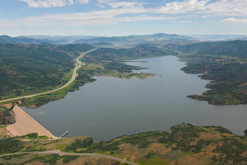 View of Jordanelle Dam and Reservoir with left highway to Park City and right highway to Kamas.