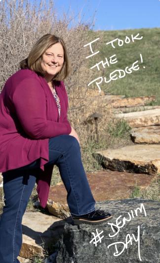 Karla Smiley from USBR, outdoors with the pledge words "I Took the Pledge" written over the picture