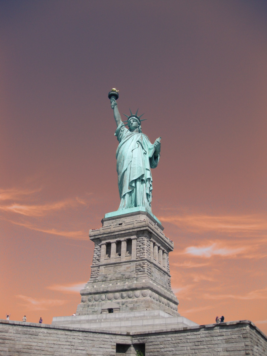 The Statue of Liberty under a purple sky