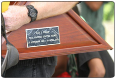 Mr. Hicks holds the flag box of his son, the late Sgt. Raymond Hicks following his Burial Service in Sekere, Sokehs May 12.