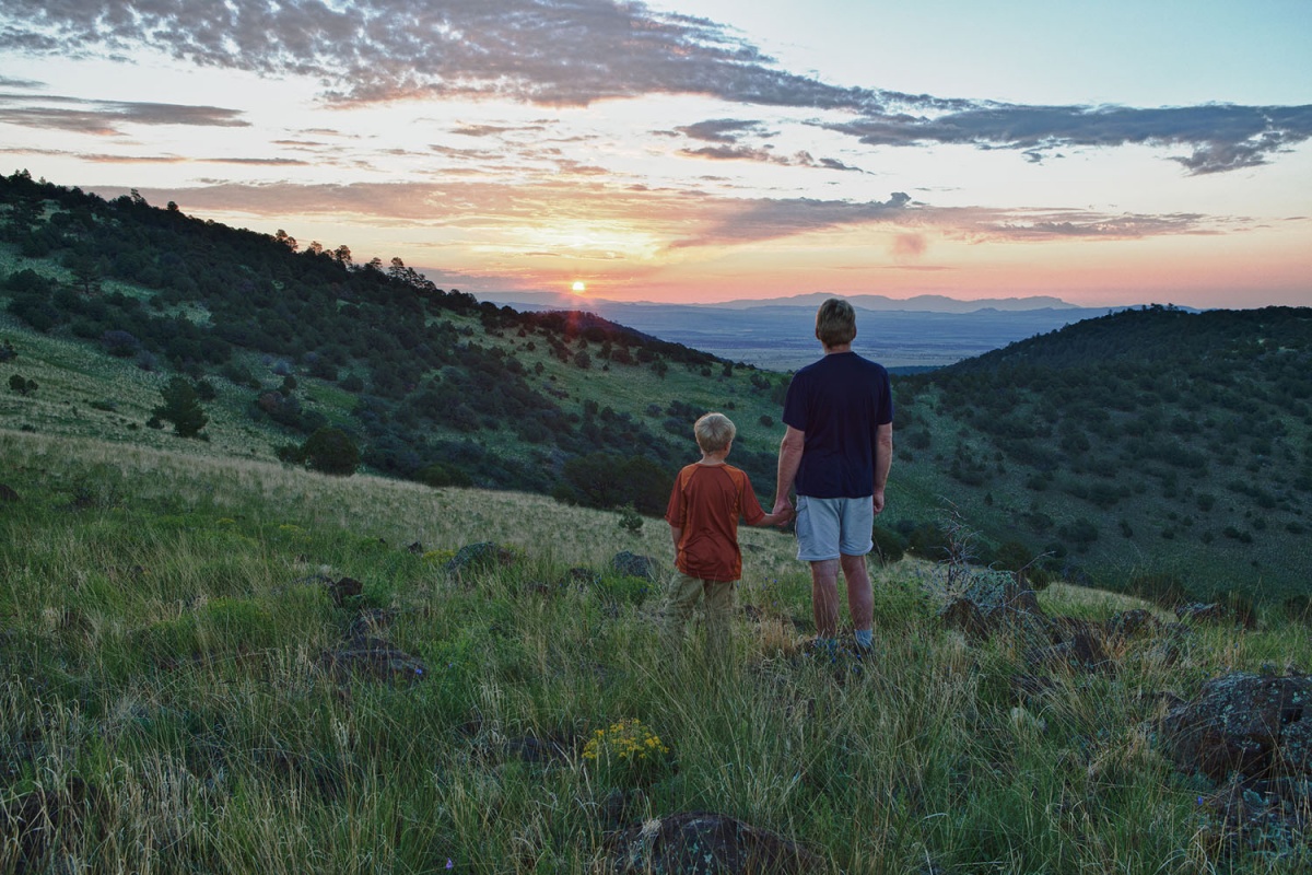 two people watching sunset 