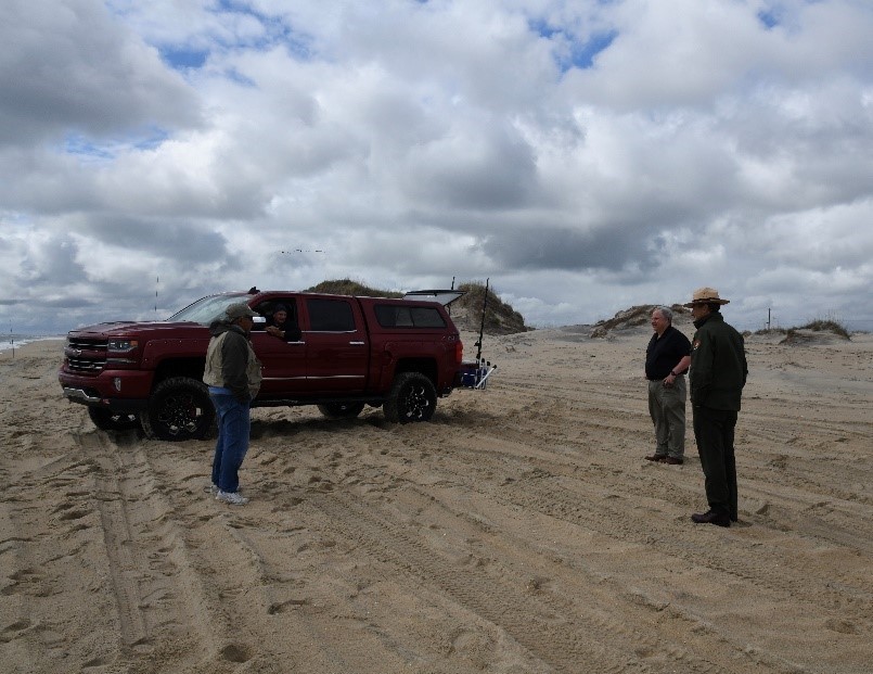 Secretary Bernhardt visits with National Park Service staff and local visitors at the Cape Hatteras National Sea Shore in Nags Head, NC.