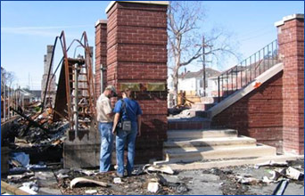 National Park Service staff assess damage in historic New Orleans for a GIS survey following Hurricane Katrina  Photo:NPS CRGIS" alt="National Park Service staff assess damage in historic New Orleans for a GIS survey following Hurricane Katrina  Photo:NPS CRGIS