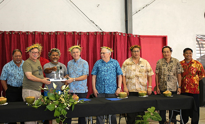 (left to right: FSM Senator Urusemal, Assistant Secretary Domenech, OIA Director Pula (in back) Larry Raigetal of Waa'gey on behalf of Habele, U.S. Ambassador Riley, DCM Pierce, Deputy Secretary Pretrick, FSM Senator Figir, Vice Principal Figueras (photo A.Kim/U.S. Embassy Kolonia)