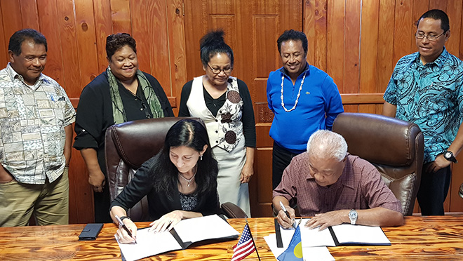 U.S. Ambassador Amy Hyatt and Republic of Palau’s Minister of Finance Elbuchel Sadang sign the Palau Compact Funding Agreement