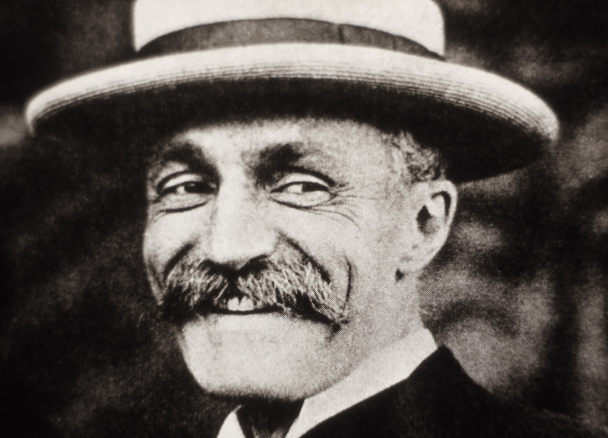 Gifford Pinchot smiles in a black and white photo close up of his face.