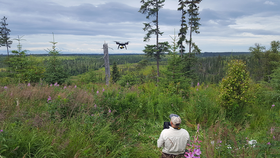 A DOI employee launches a 3DR Solo UAS in Alaska on a mission using the expanded FAA authorities for Extended Visual Line of Sight operations.