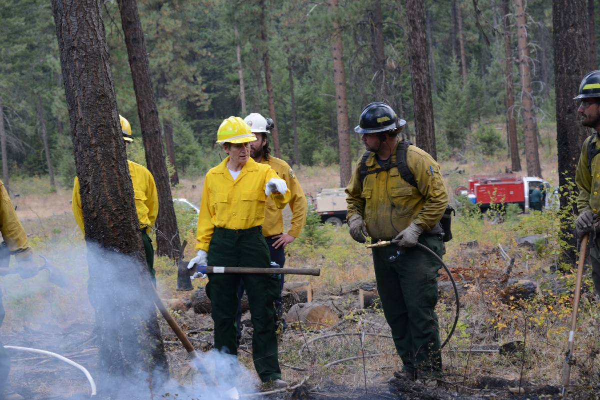 Secretary Jewell speaks with firefighters